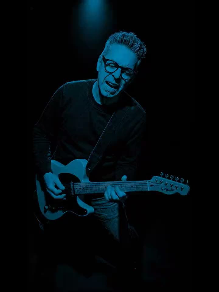 The BluesMaker performing Call Me Analog Man on electric guitar.